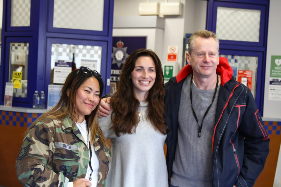 An image of a married couple meeting Julia Goulding, who plays Shona Platt, at the Coronation Street Experience: Star Tour, for an anniversary gift.