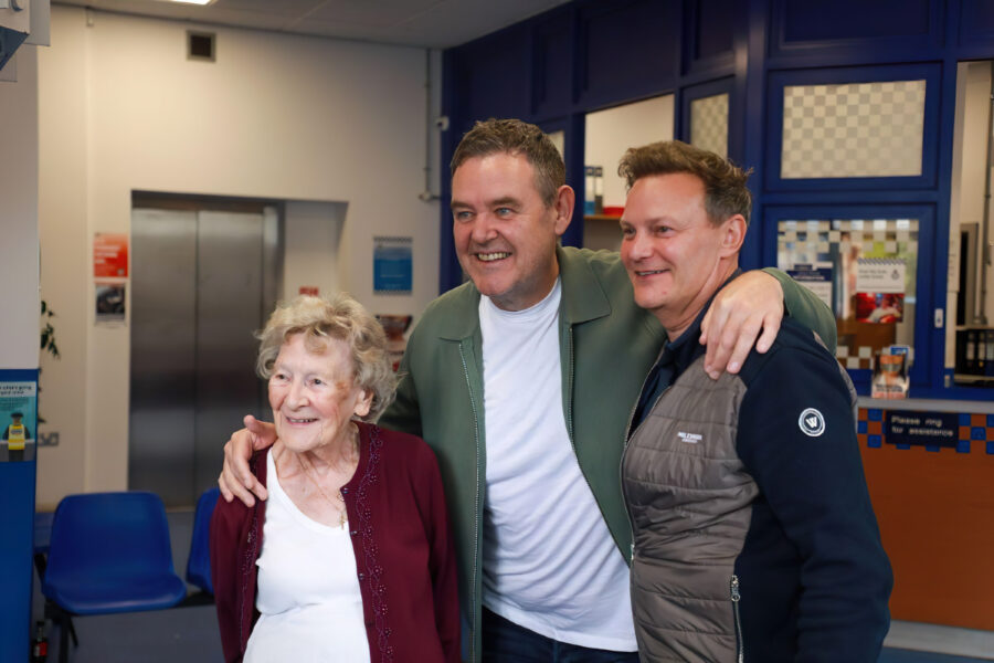 Tony Maudsley, who plays George Shuttleworth, posing for a photograph with guests at a Coronation Street meet and greet.